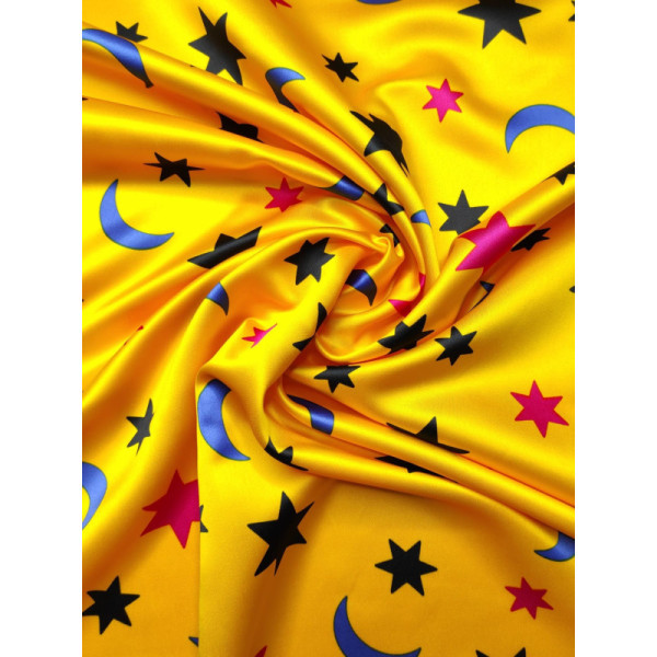 Tela de raso amarillo estampado estrellas