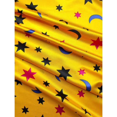 Tela de raso amarillo estampado estrellas
