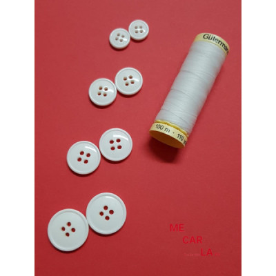 Botón blanco cuatro agujeros